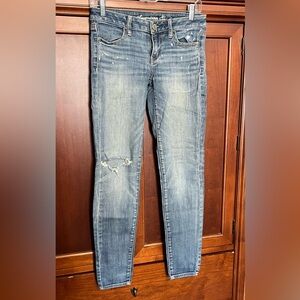 Women's Blue Distressed Jeans